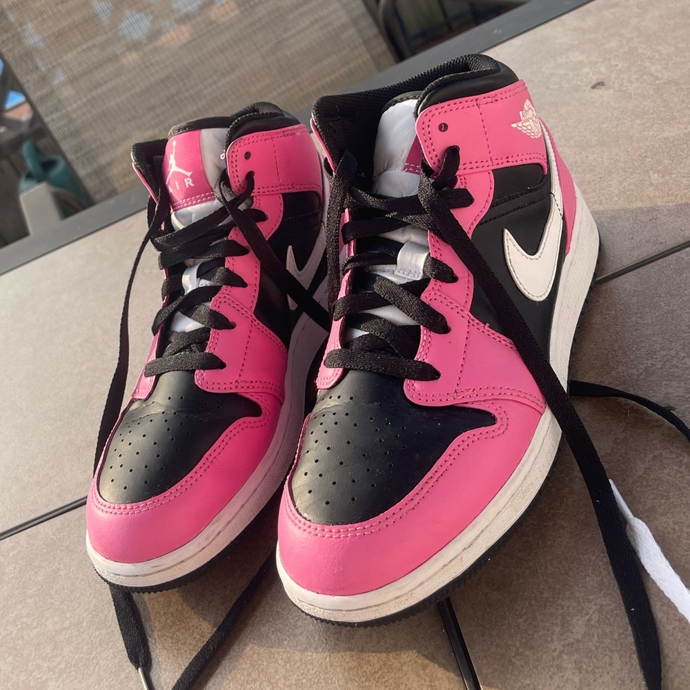 Hot pink and Black Nike sneakers